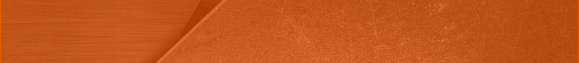 A striking visual of an orange backdrop paired with a white surface, creating a bold color contrast.